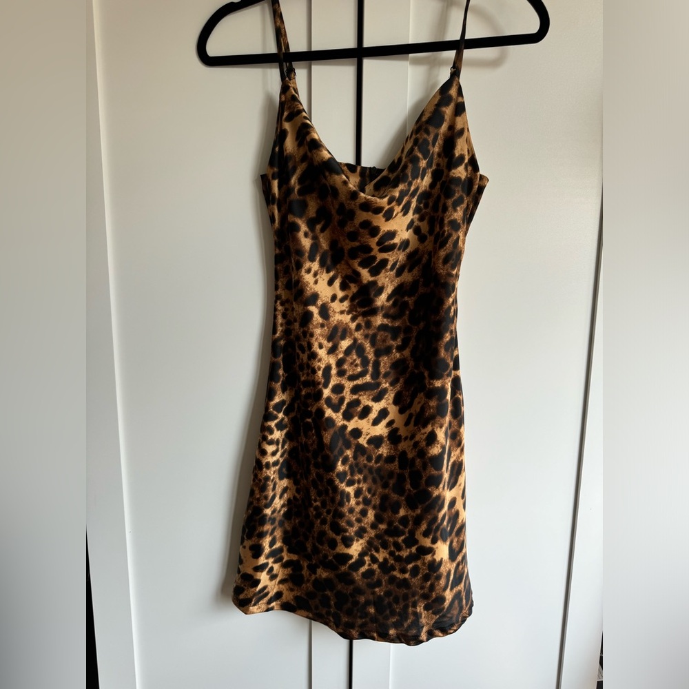 Cheetah print mini dress with adjustable spaghetti straps in size small